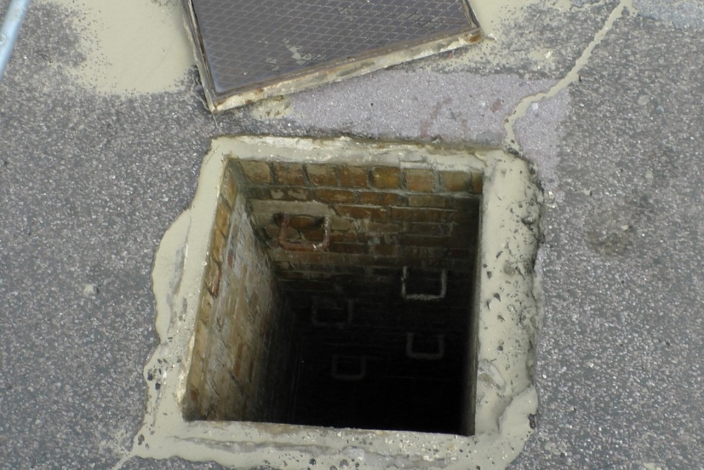 Plumbers fined after blind man falls into manhole